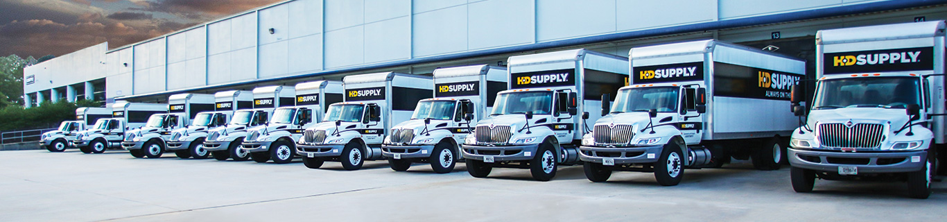HD Supply Trucks Lined Up At A Warehouse